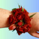 Beautiful petite wrist corsage in red and green.